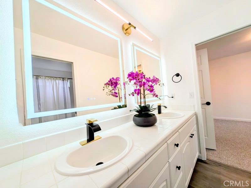 5377 Lancaster Road Lakeport, CA 95453 - Photo 5 of 20 a bathroom with a sink and a mirror