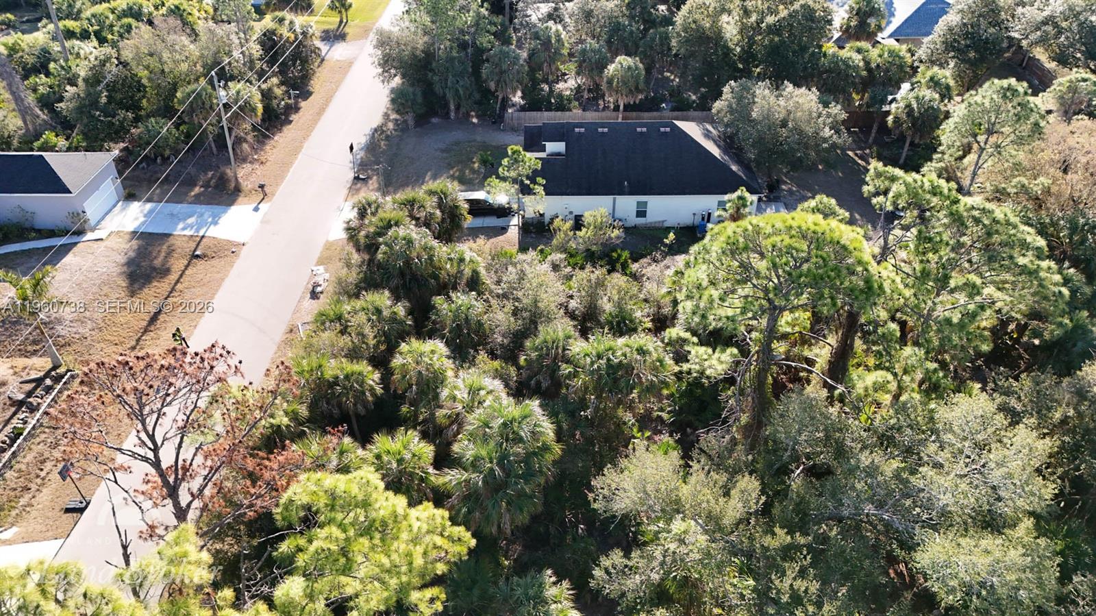 0 Sparkle Lane North Port, FL 34286 - Photo 13 of 17 a aerial view of house with yard and outdoor seating