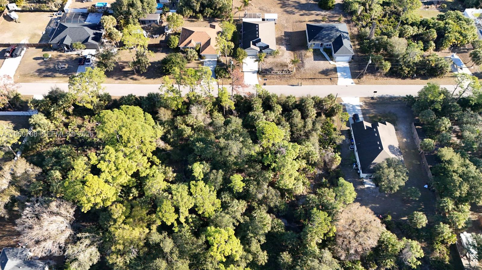 0 Sparkle Lane North Port, FL 34286 - Photo 7 of 17 a view of outdoor space and covered with trees