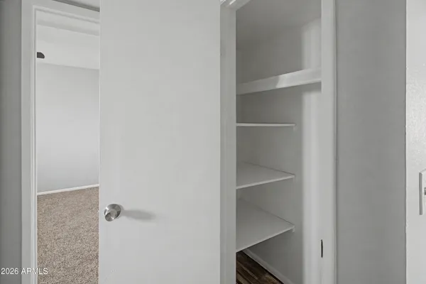 a view of an empty room with window