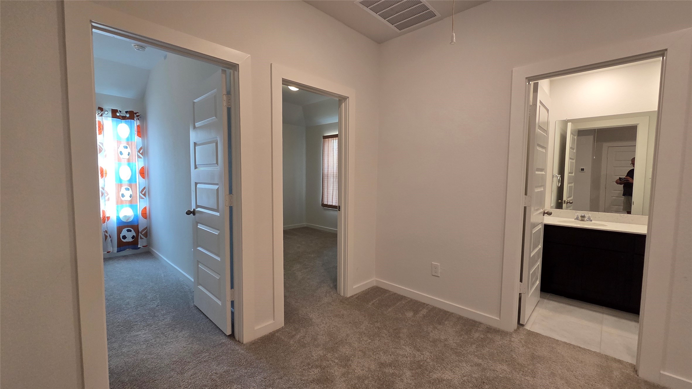1015 Thor Roman Forest, TX 77357 - Photo 11 of 15 hallway with view of bedroom and bathroom