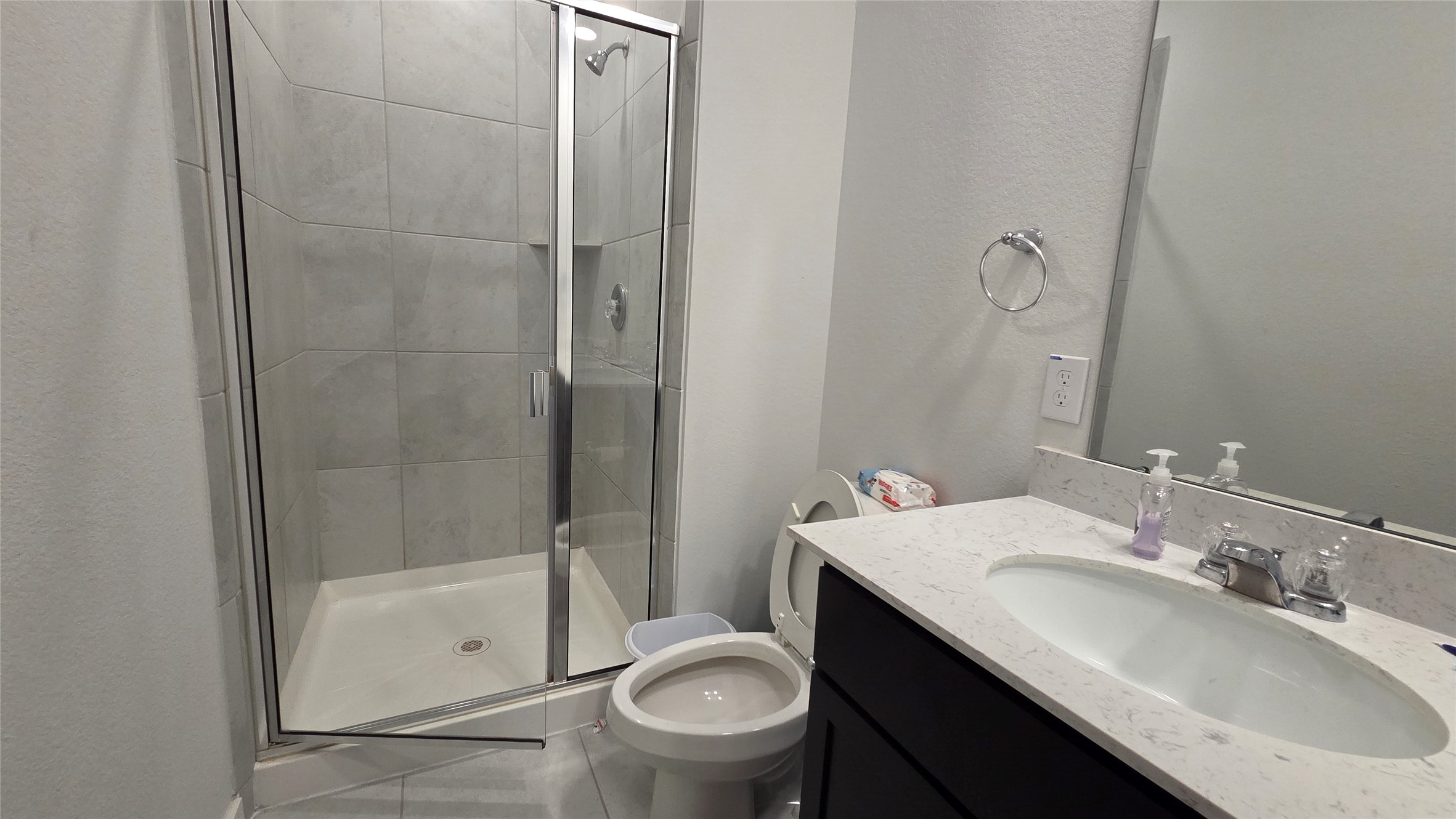 1015 Thor Roman Forest, TX 77357 - Photo 8 of 15 a bathroom with a sink toilet and shower