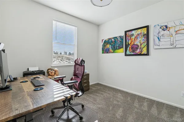 a view of a workspace with furniture