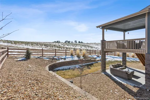a view of a balcony with wooden floor