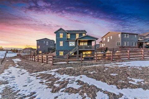 a front view of a house with parking space