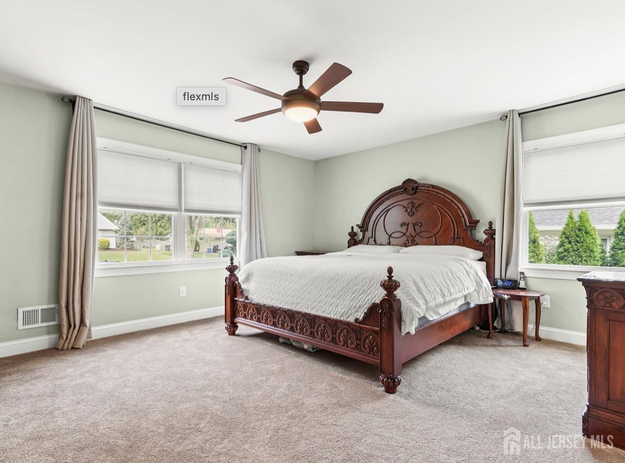 13 Crabtree Road Old Bridge, NJ 07747 - Photo 17 of 32 a bed sitting in a spacious bedroom next to a window