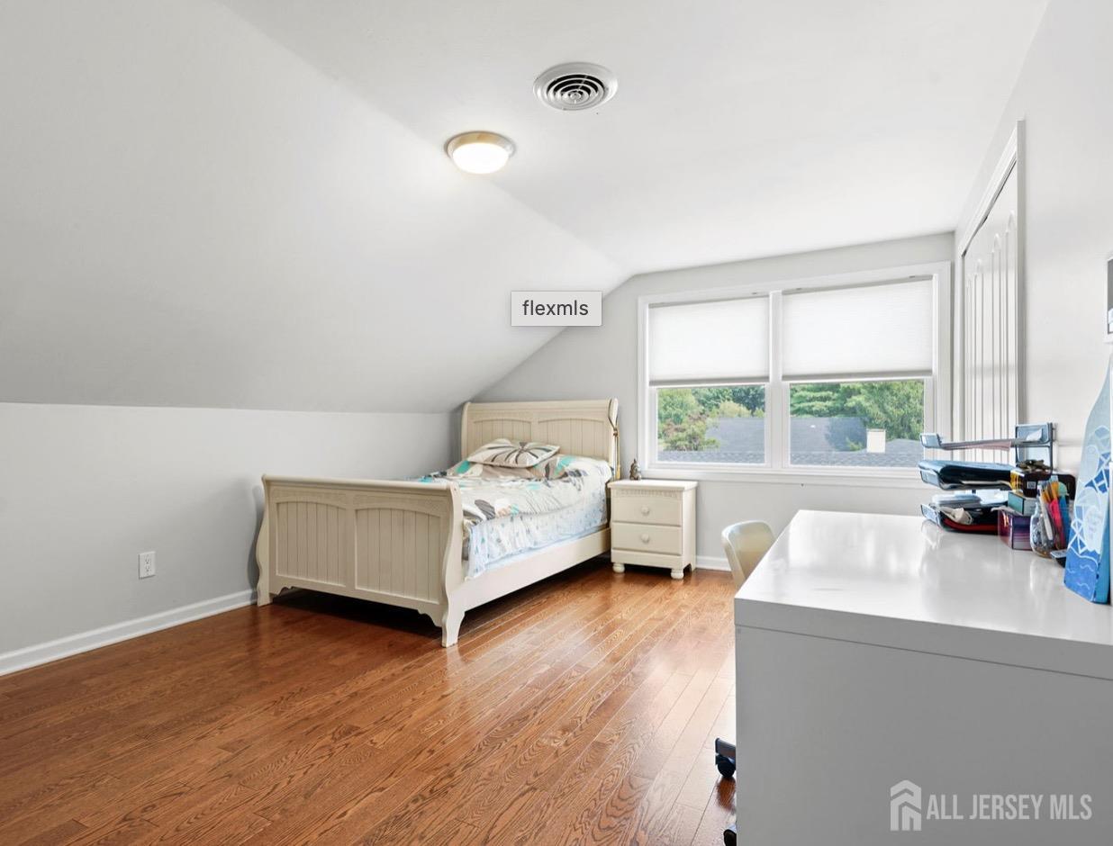 13 Crabtree Road Old Bridge, NJ 07747 - Photo 21 of 32 a living room with furniture and a large window