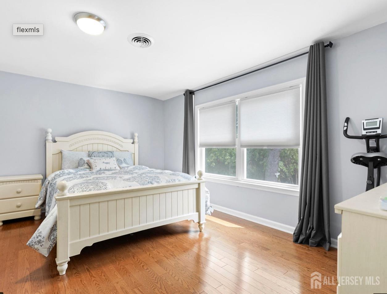 13 Crabtree Road Old Bridge, NJ 07747 - Photo 23 of 32 a bedroom with a bed and a window