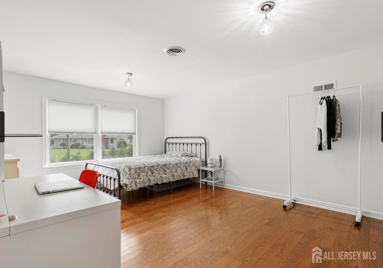 13 Crabtree Road Old Bridge, NJ 07747 - Photo 26 of 32 a bedroom with a bed and window