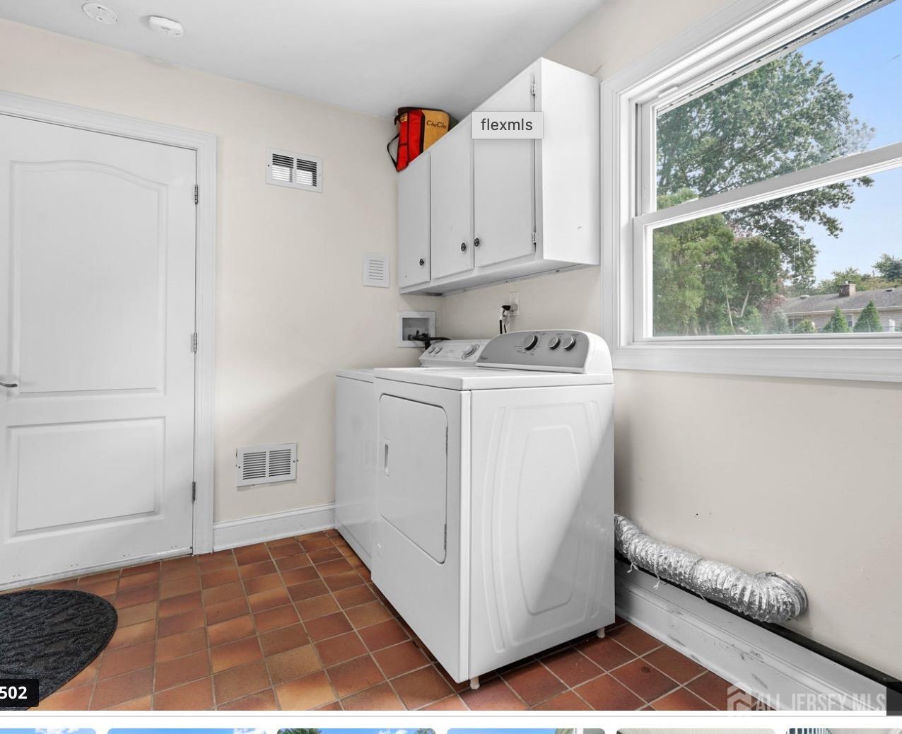 13 Crabtree Road Old Bridge, NJ 07747 - Photo 28 of 32 a utility room with cabinets washer and dryer