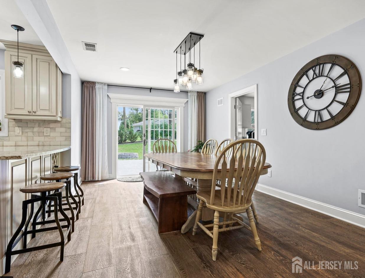 13 Crabtree Road Old Bridge, NJ 07747 - Photo 7 of 32 a view of a dining room with furniture window and wooden floor