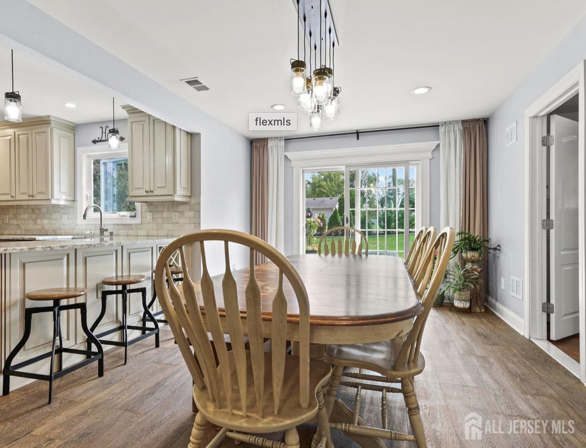 13 Crabtree Road Old Bridge, NJ 07747 - Photo 8 of 32 a view of a dining room with furniture window and wooden floor