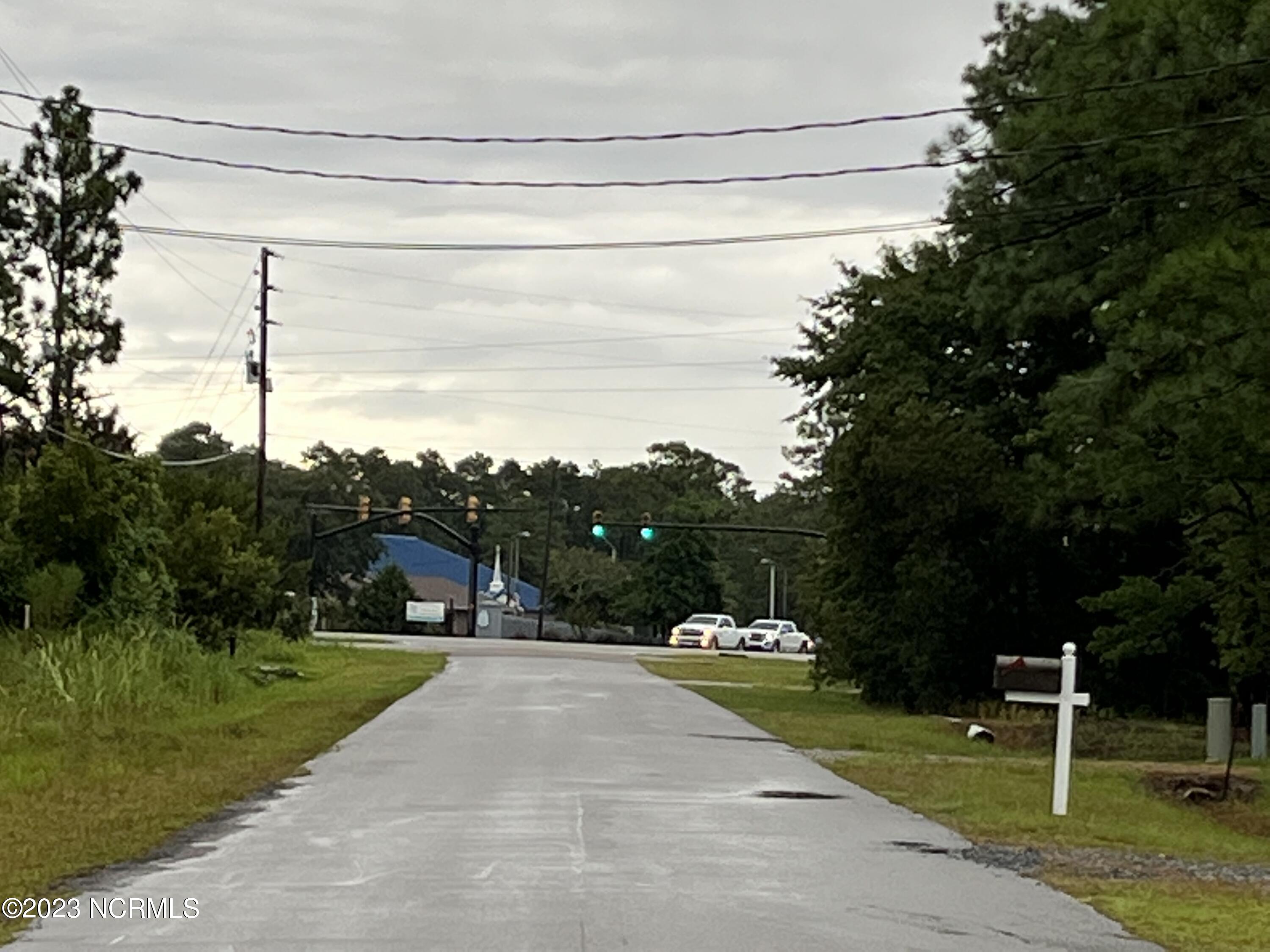 L27 West Boiling Spring Road Southport, NC 28461 - Photo 2 of 14 Leaving lot and headed toward town