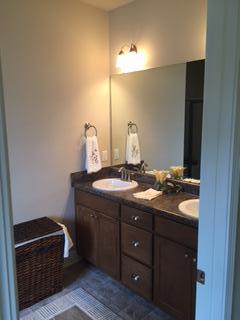3636 Ranch Drive Crestview, FL 32539 - Photo 16 of 26 a bathroom with a sink and a mirror