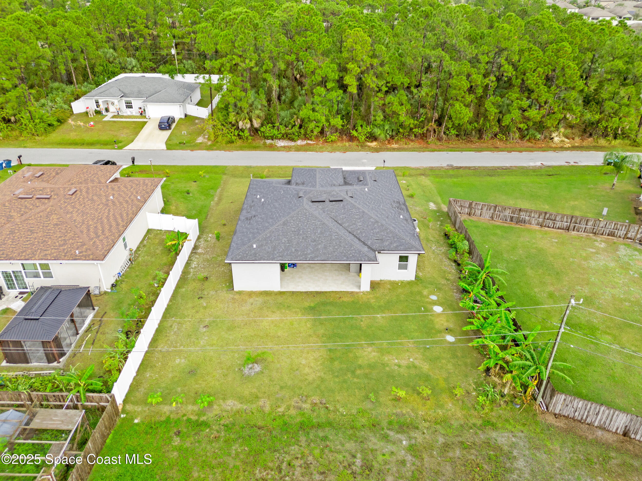 434 Flagler Road Southeast Palm Bay, FL 32909 - Photo 33 of 36 an aerial view of a house with a big yard