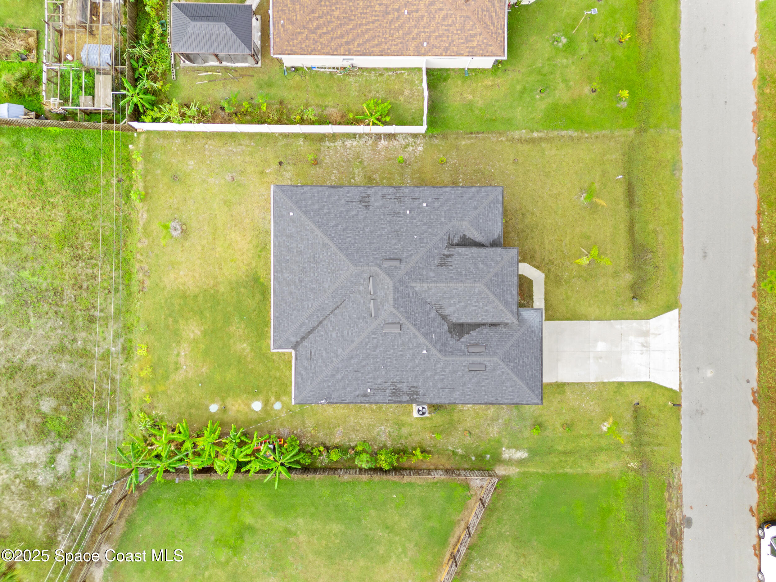 434 Flagler Road Southeast Palm Bay, FL 32909 - Photo 34 of 36 an aerial view of a residential houses with outdoor space and swimming pool
