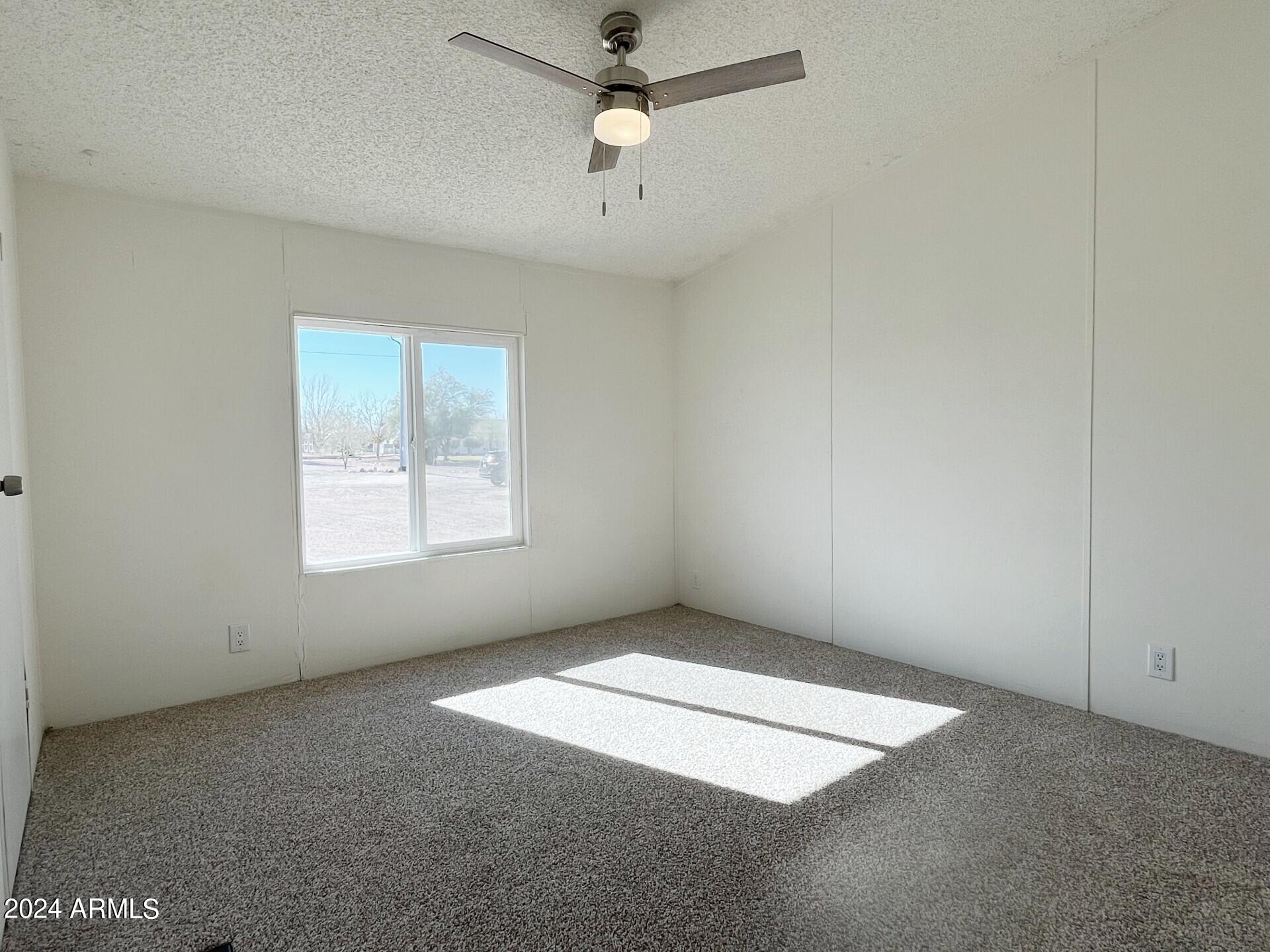 8410 South Johnson Road Buckeye, AZ 85326 - Photo 13 of 21 Master Bedroom