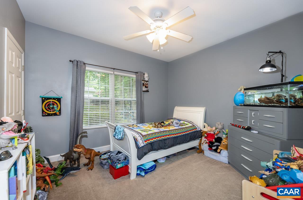 5 Tanglewood Road Palmyra, VA 22963 - Photo 13 of 17 a bedroom with bed and a window
