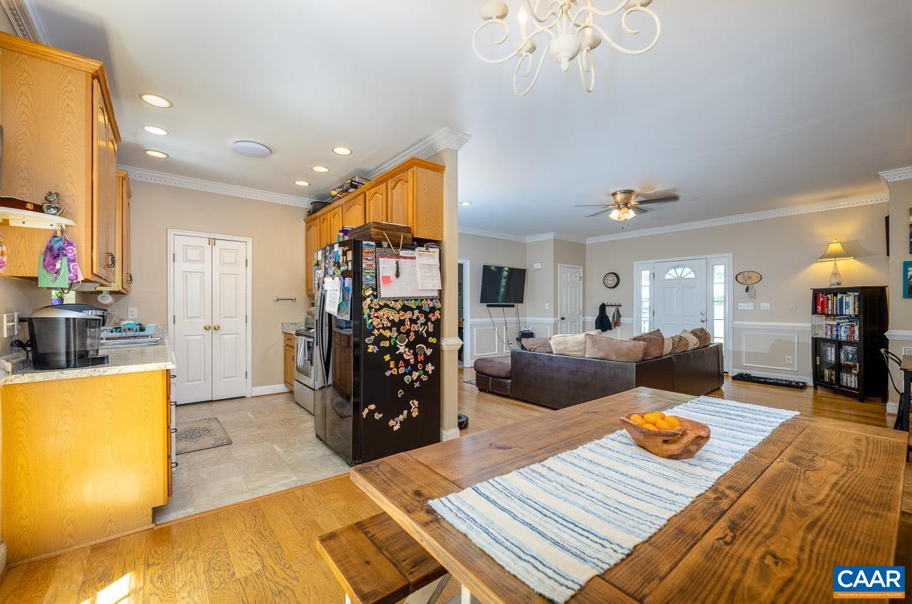 5 Tanglewood Road Palmyra, VA 22963 - Photo 14 of 17 a living room with furniture and a table