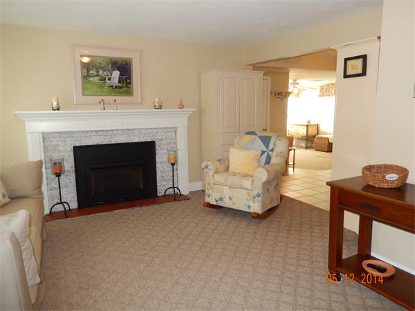 672 County Road Barrington, RI 02806 - Photo 2 of 13 a living room with furniture and a fireplace