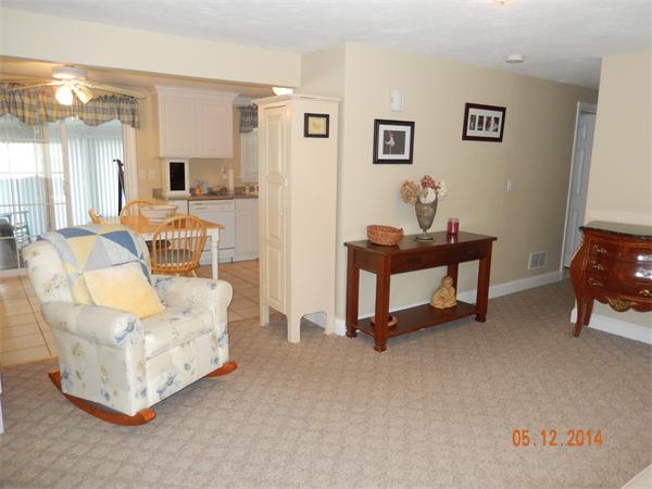 672 County Road Barrington, RI 02806 - Photo 3 of 13 a living room with furniture and a table