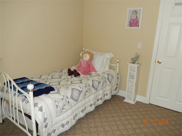 672 County Road Barrington, RI 02806 - Photo 6 of 13 a bedroom with a bed and a painting on the wall