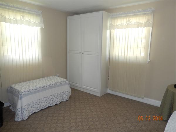 672 County Road Barrington, RI 02806 - Photo 7 of 13 a room with a bed and a window