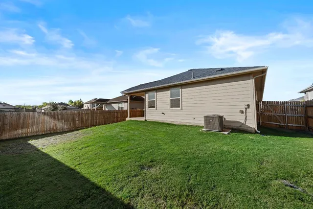 a view of a backyard with a garden