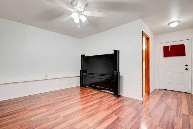 6905 Cermak Road Berwyn, IL 60402 - Photo 13 of 29 a view of an empty room with wooden floor