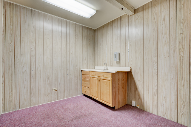 6905 Cermak Road Berwyn, IL 60402 - Photo 22 of 29 a bathroom with a sink and a mirror