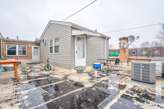 6905 Cermak Road Berwyn, IL 60402 - Photo 27 of 29 a backyard of a house with yard and outdoor seating