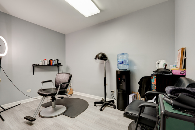 6905 Cermak Road Berwyn, IL 60402 - Photo 4 of 29 a work room with furniture and gym equipment