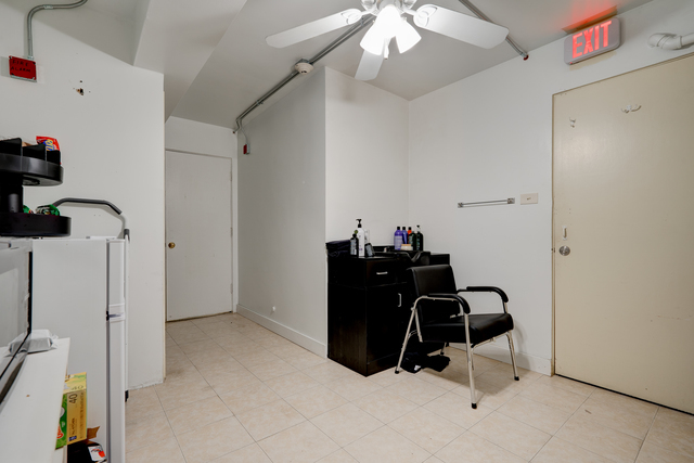 6905 Cermak Road Berwyn, IL 60402 - Photo 6 of 29 a room with furniture and gym equipment