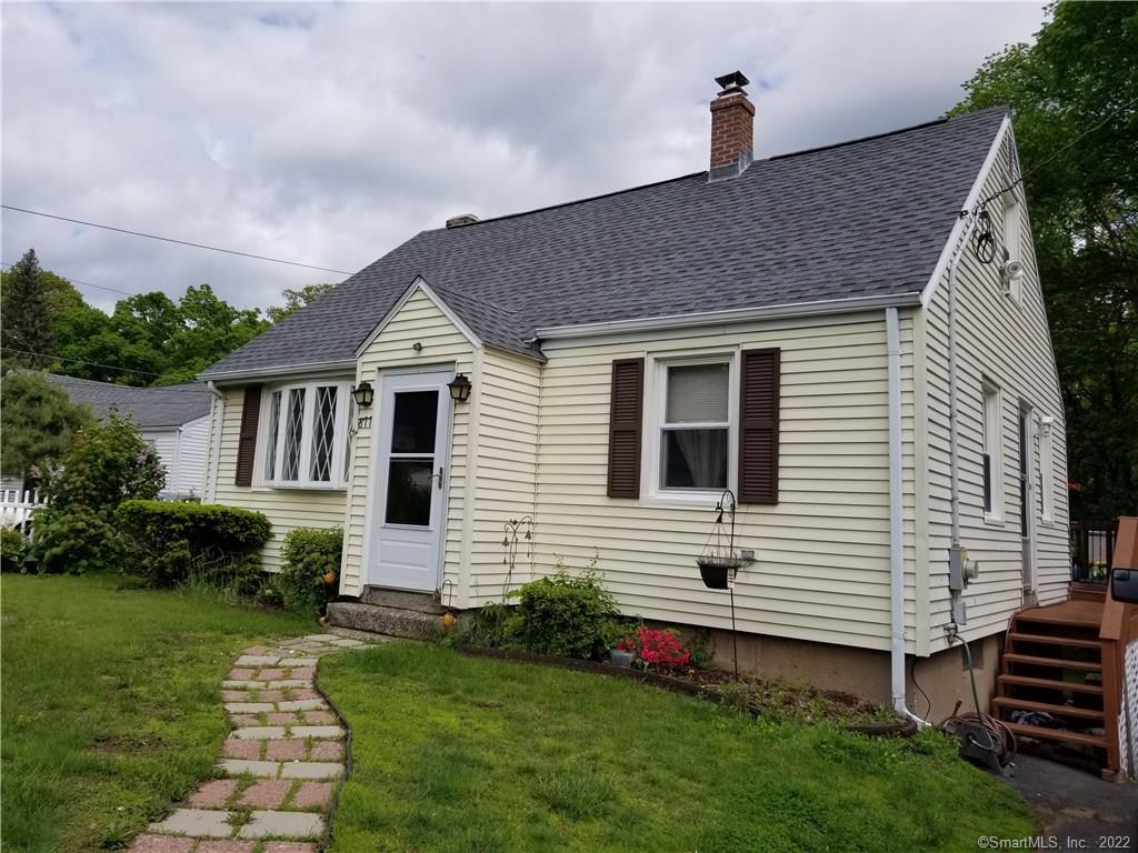 877 Slater Road New Britain, CT 06053 - Photo 1 of 1 a front view of a house with a yard