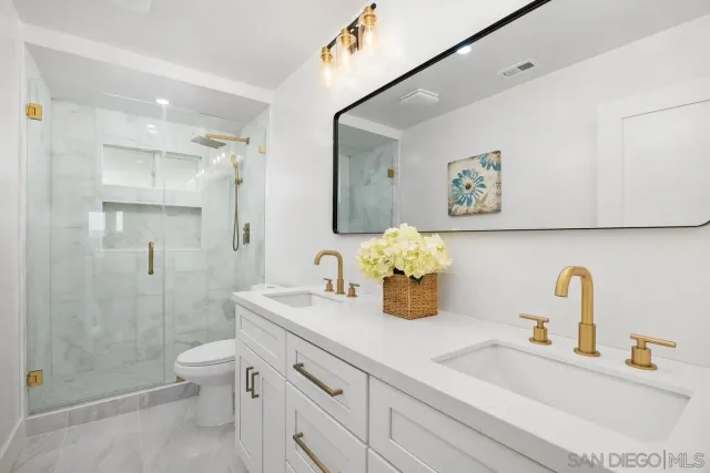 a bathroom with a sink and a toilet