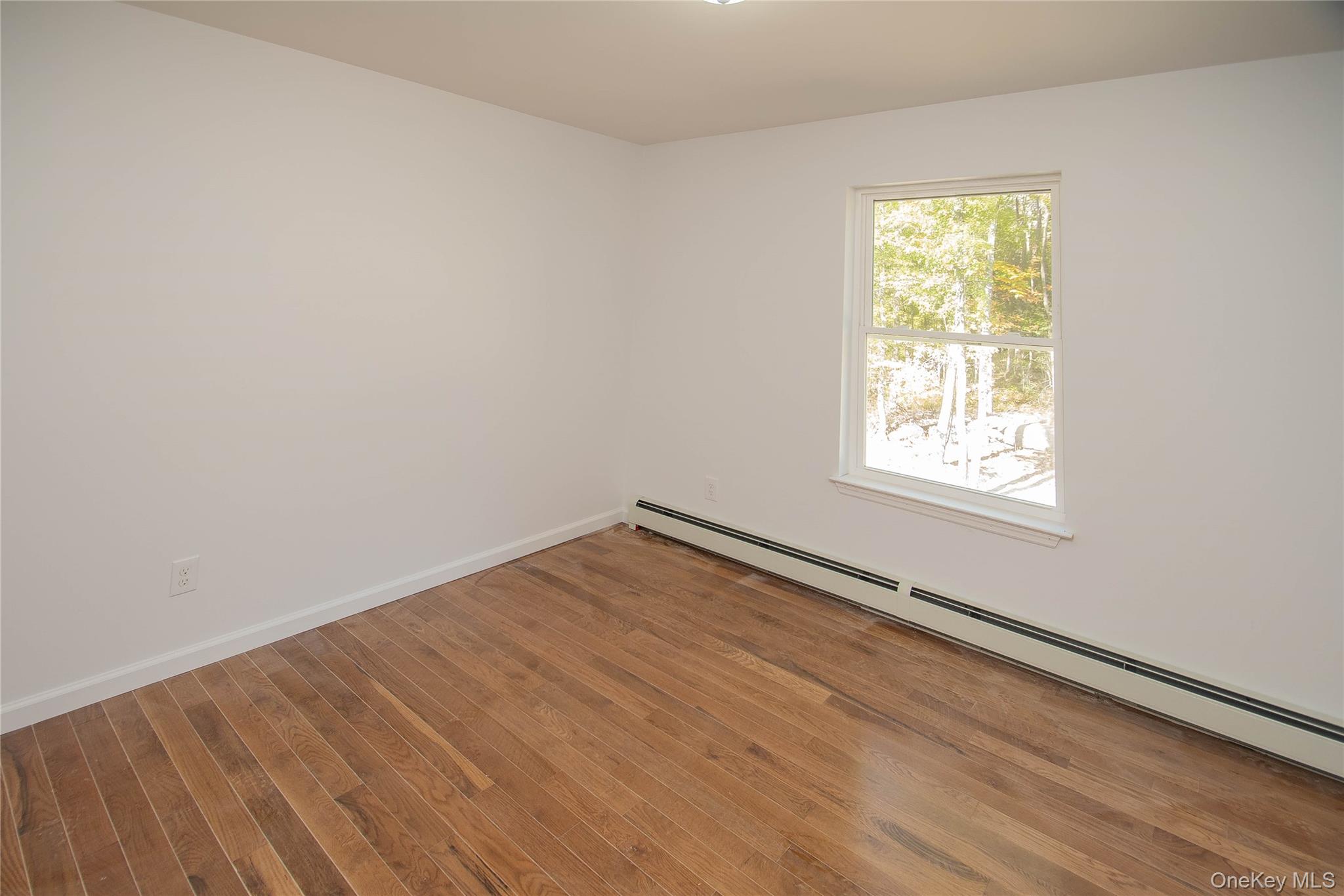 458 County Route 50 New Hampton, NY 10958 - Photo 15 of 35 an empty room with a window