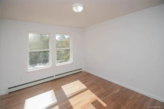 a bathroom with a double vanity sink mirror and