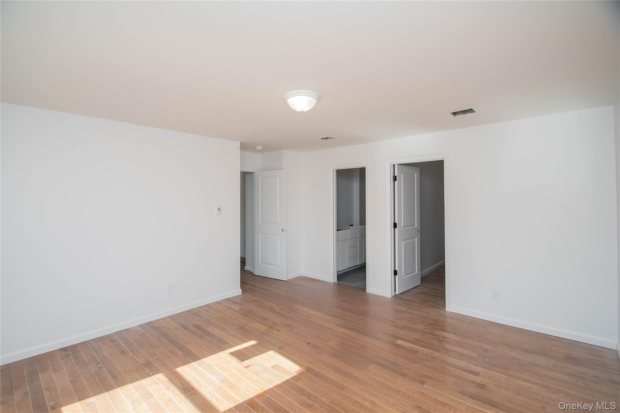 458 County Route 50 New Hampton, NY 10958 - Photo 19 of 35 Unfurnished room featuring light wood-style flooring and baseboards