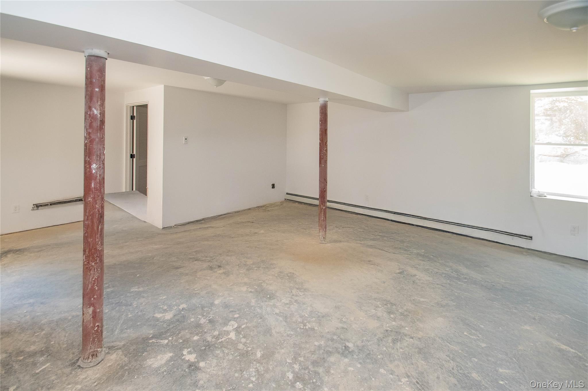 458 County Route 50 New Hampton, NY 10958 - Photo 25 of 35 Below grade area with a baseboard heating unit