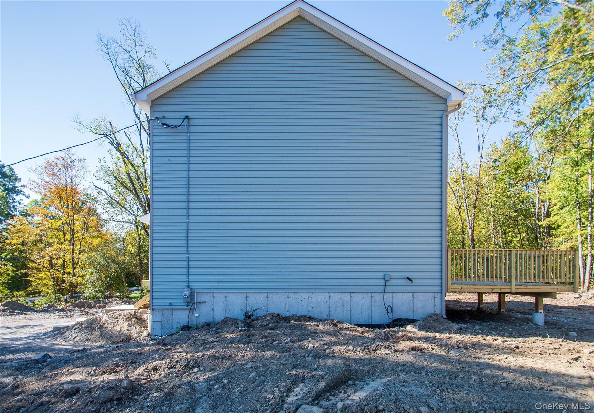 458 County Route 50 New Hampton, NY 10958 - Photo 31 of 35 a view of a house with a backyard