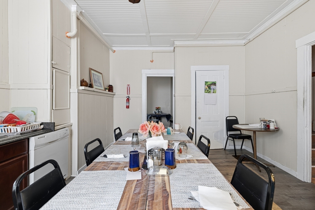 550 County Street New Bedford, MA 02740 - Photo 8 of 23 a living room with furniture and a wooden floor
