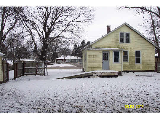 115 1st Avenue Rochelle, IL 61068 - Photo 3 of 10 a view of a house with backyard