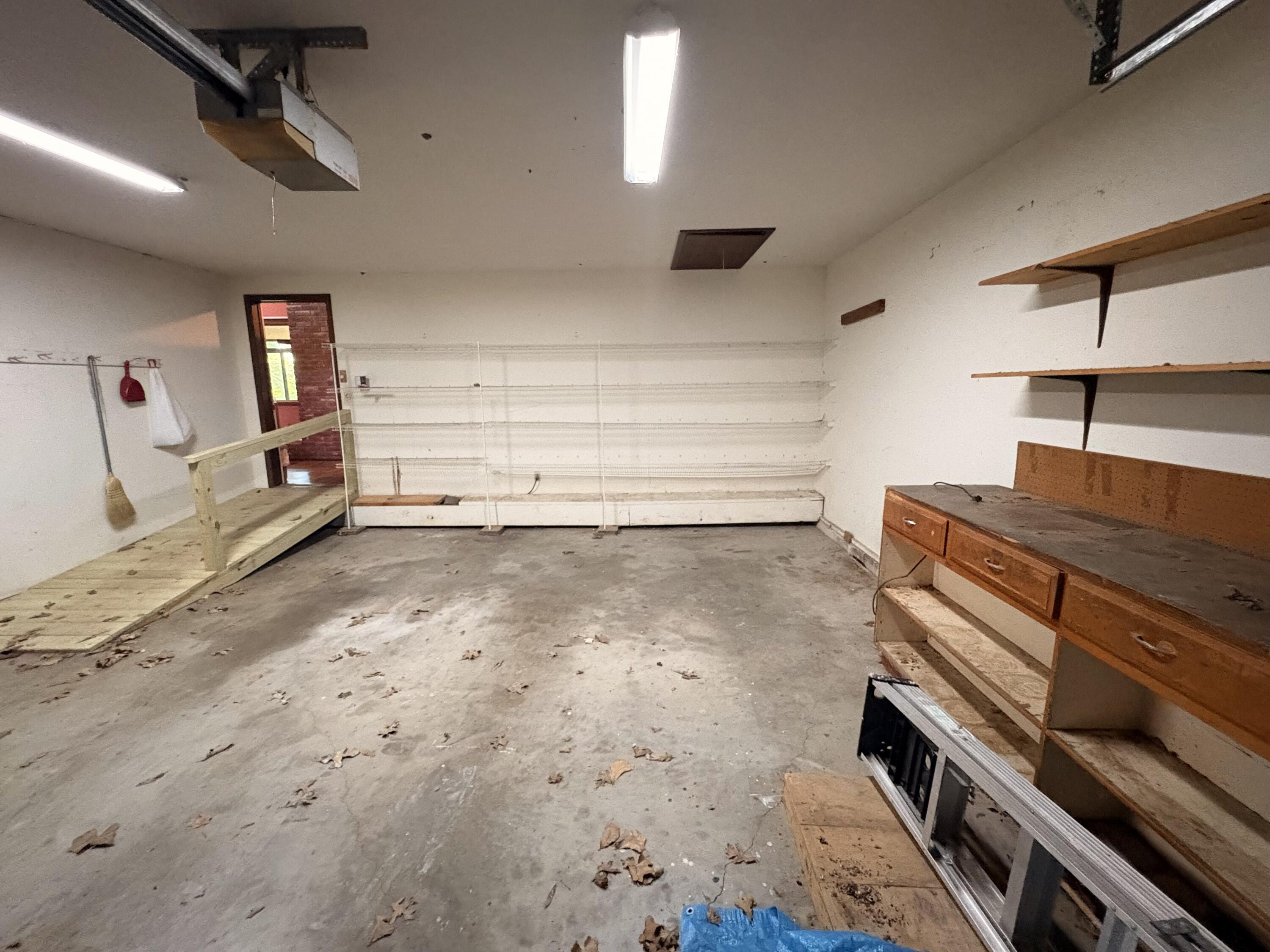 1352 East 400th Road Bolivar, MO 65613 - Photo 40 of 71 Attached Garage with Shelving