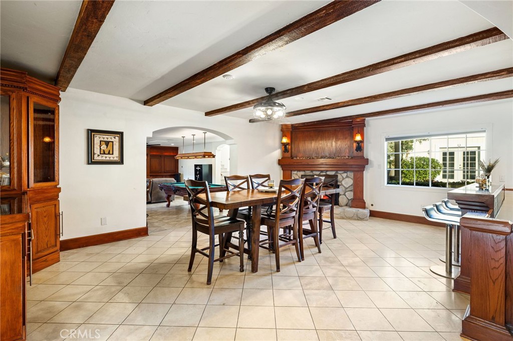 242 Summit Road La Verne, CA 91750 - Photo 29 of 75 a view of a dining room with furniture and a potted plant