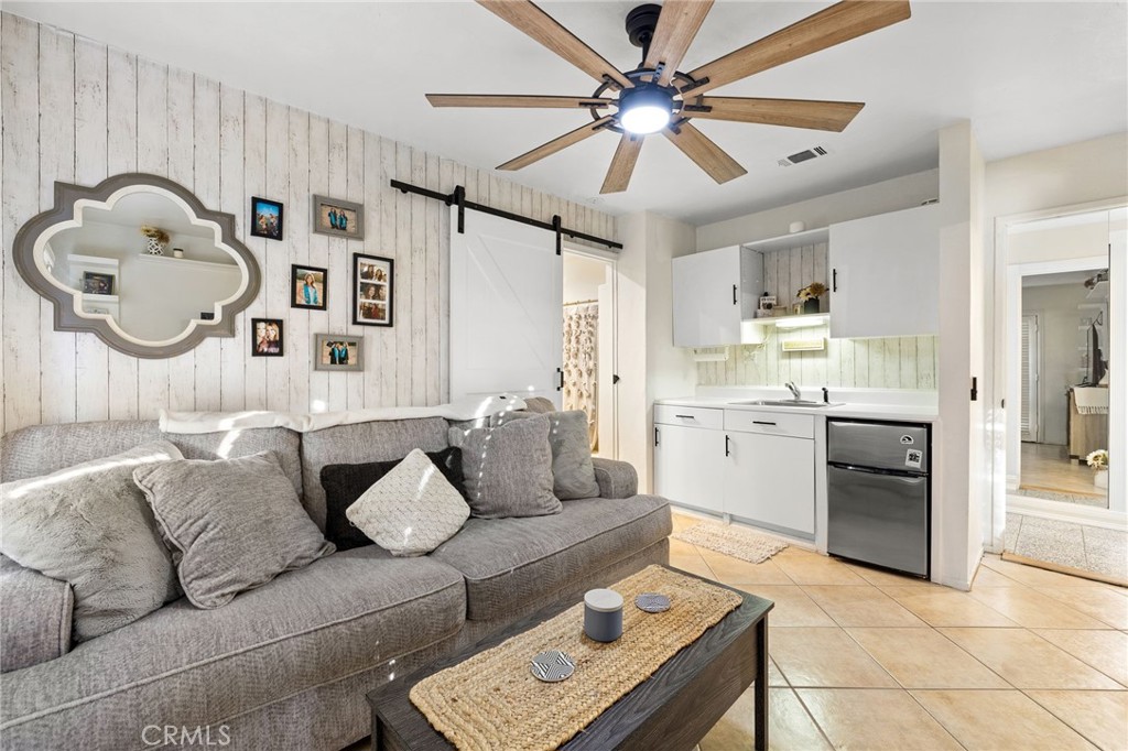 242 Summit Road La Verne, CA 91750 - Photo 49 of 75 a living room with furniture and kitchen view