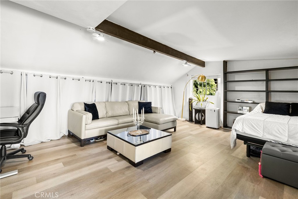 242 Summit Road La Verne, CA 91750 - Photo 56 of 75 a living room with furniture and a flat screen tv