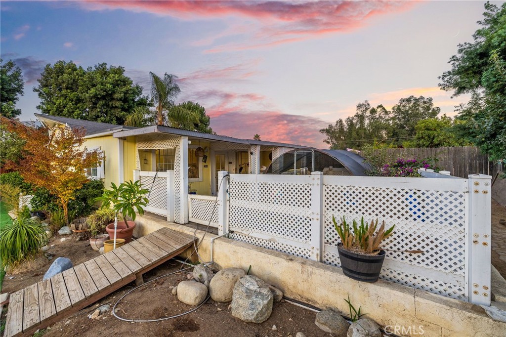 242 Summit Road La Verne, CA 91750 - Photo 68 of 75 a front view of a house with a garden