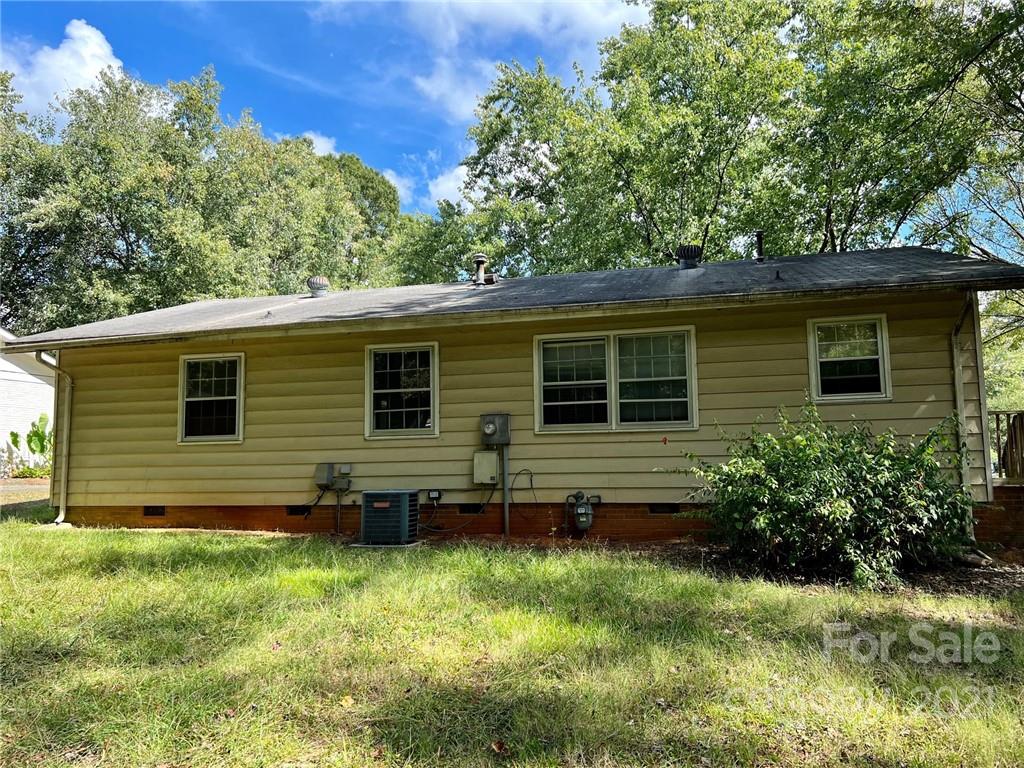 1018 Tilden Road Charlotte, NC 28214 - Photo 16 of 17 a view of house with backyard