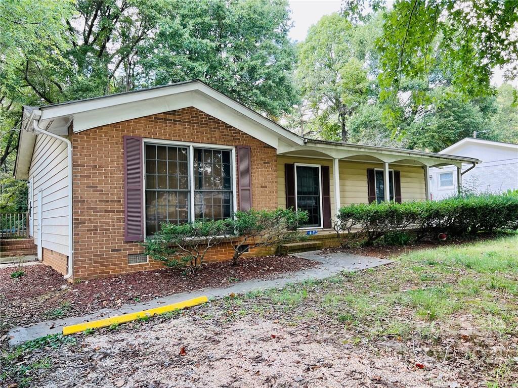 1018 Tilden Road Charlotte, NC 28214 - Photo 3 of 17 a view of a house with yard and plants