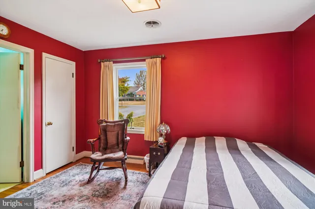 a view of a livingroom with furniture and a chair